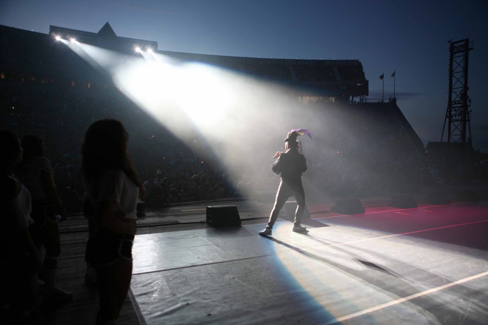 A man is on stage with a microphone