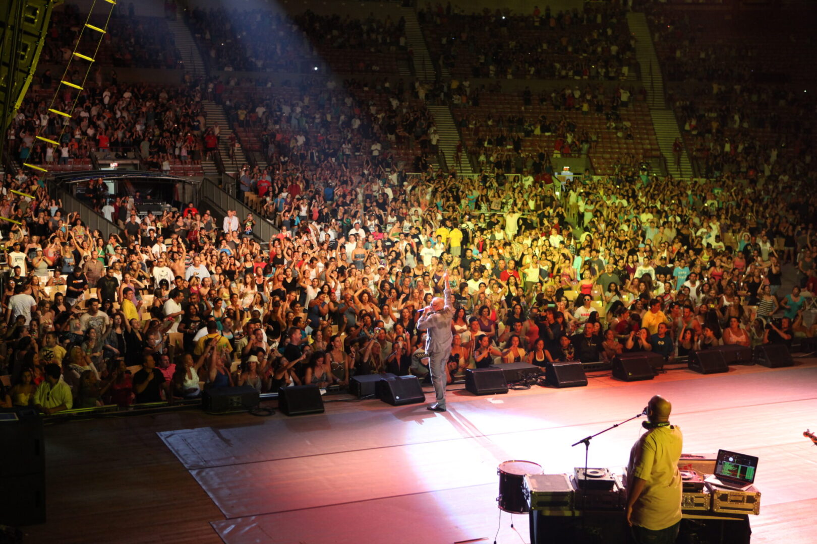 A crowd of people in the stands at an event.